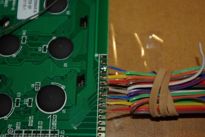 Soldering the cable to the LCD